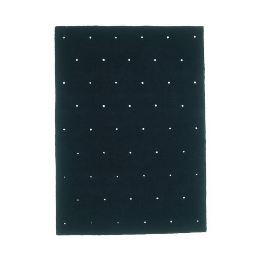 Designed by Thomas Sandell 2000.  Hand tufted rug with a perforated pattern.