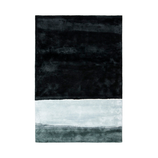 The Horizon Midnight rug has a moonlight landscape, hand-cut details, and mixed compositions of yarn in a fixed blend. It is made of a special wool and Tencel blend. Horizon is designed to be hung on the wall or lay on the floor. 