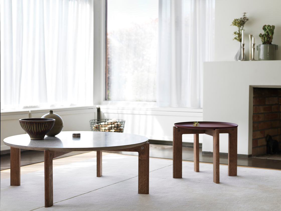 Designed by Daniel Lavonius Jarefeldt 2023. Iris round coffee table with a monochrome top with a distinctive raised edge. This comes in four colors that can be nicely combined in a setting with stone tops. Available in all three sizes.