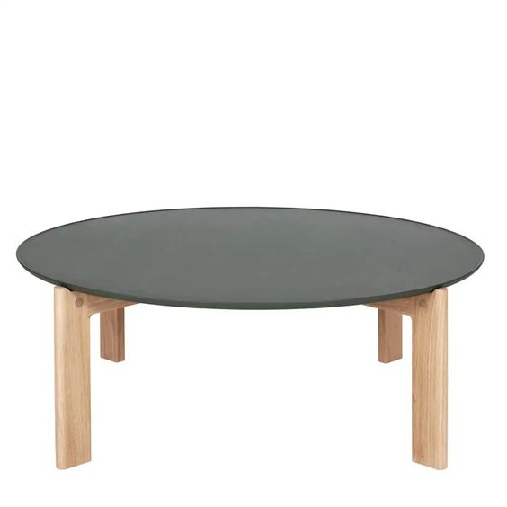 Designed by Daniel Lavonius Jarefeldt 2023. Iris round coffee table with a monochrome top with a distinctive raised edge. This comes in four colors that can be nicely combined in a setting with stone tops. Available in all three sizes.