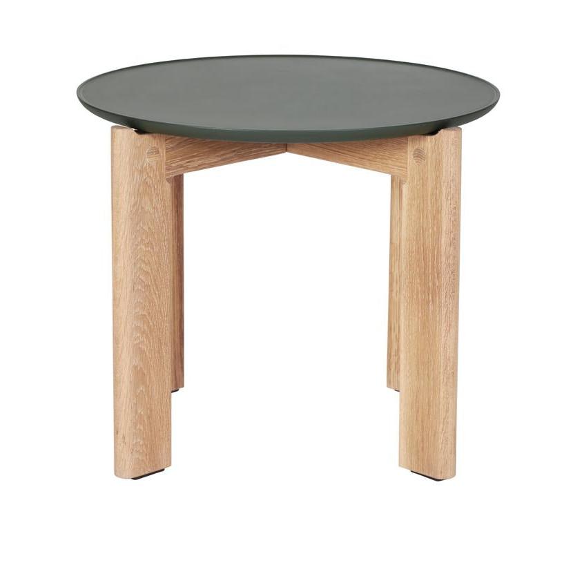 Designed by Daniel Lavonius Jarefeldt 2023.  Iris round coffee table with a monochrome top with a distinctive raised edge. This comes in four colors that can be nicely combined in a setting with stone tops. Available in all three sizes.