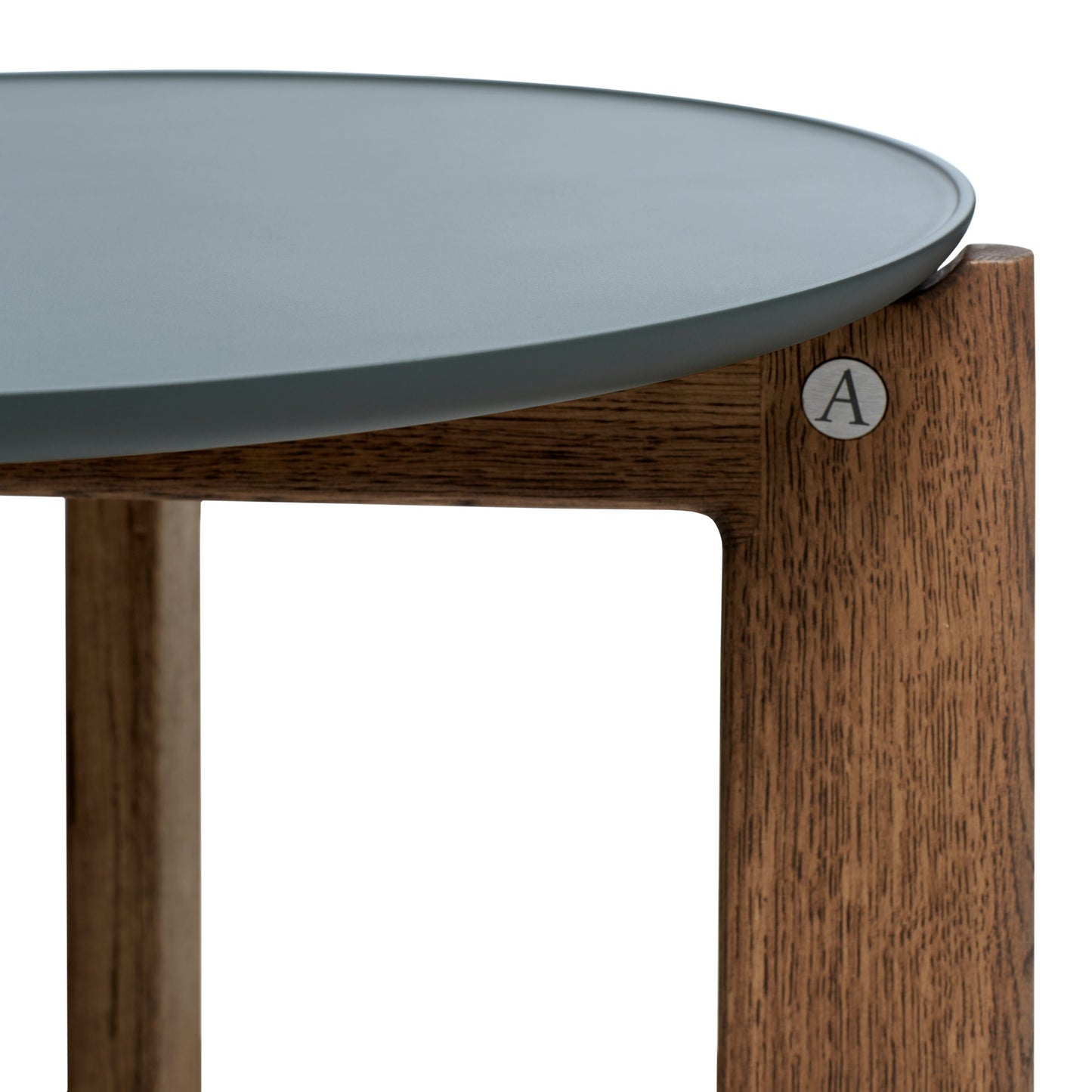 Designed by Daniel Lavonius Jarefeldt 2023. Iris round coffee table with a monochrome top with a distinctive raised edge. This comes in four colors that can be nicely combined in a setting with stone tops. Available in all three sizes.