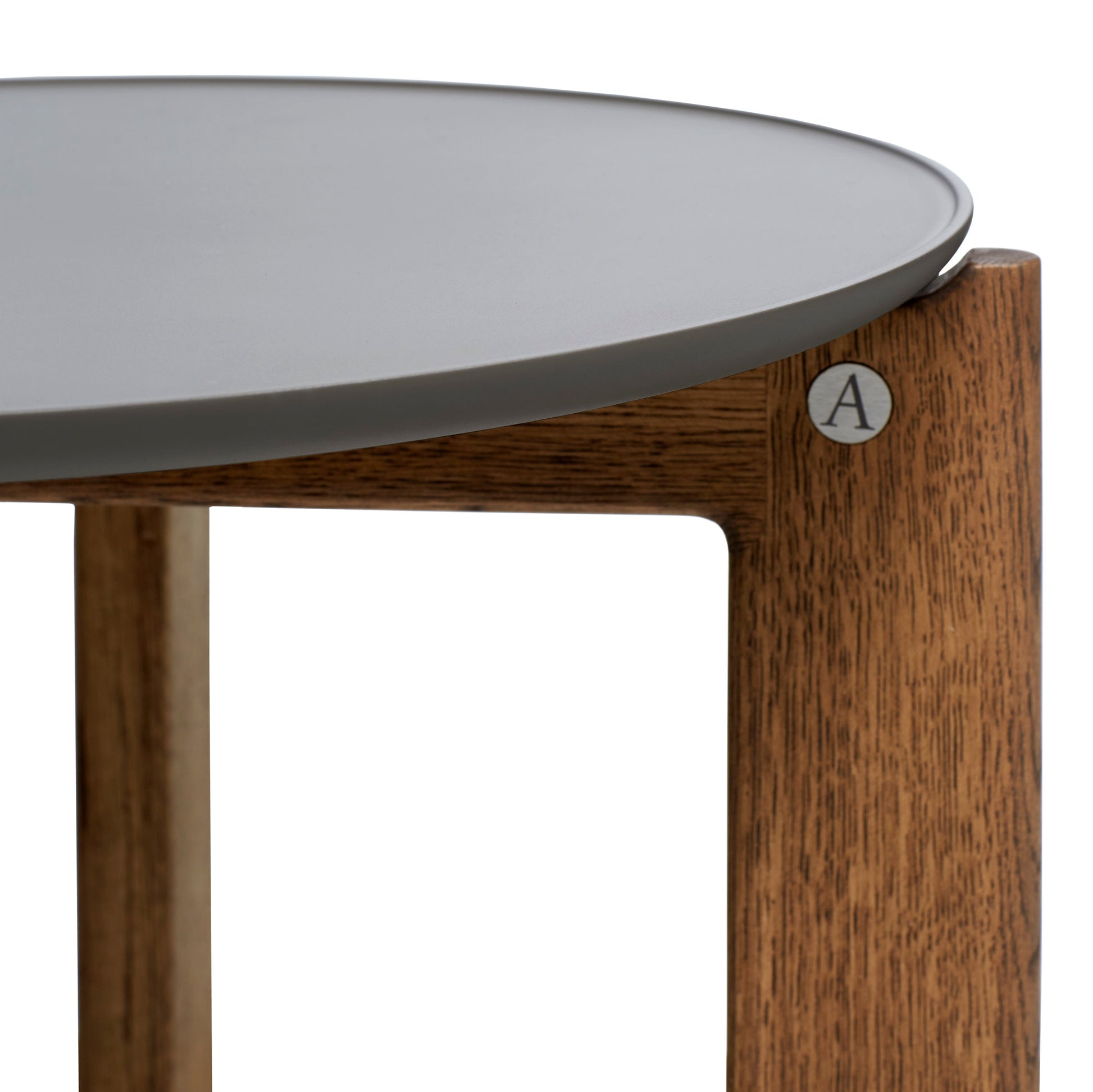 Designed by Daniel Lavonius Jarefeldt 2023.  Iris round coffee table with a monochrome top with a distinctive raised edge. This comes in four colors that can be nicely combined in a setting with stone tops. Available in all three sizes.