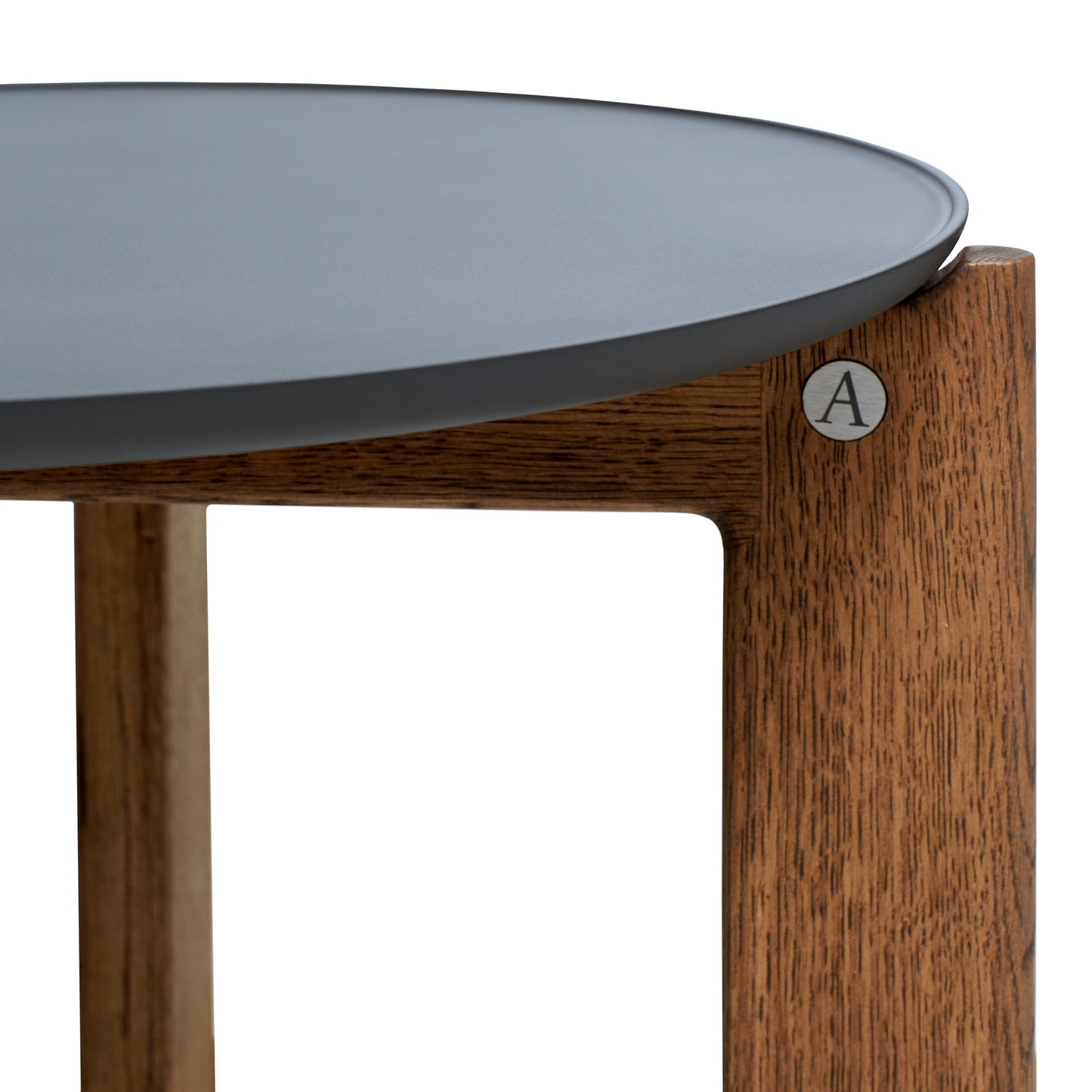Designed by Daniel Lavonius Jarefeldt 2023. Iris round coffee table with a monochrome top with a distinctive raised edge. This comes in four colors that can be nicely combined in a setting with stone tops. Available in all three sizes.
