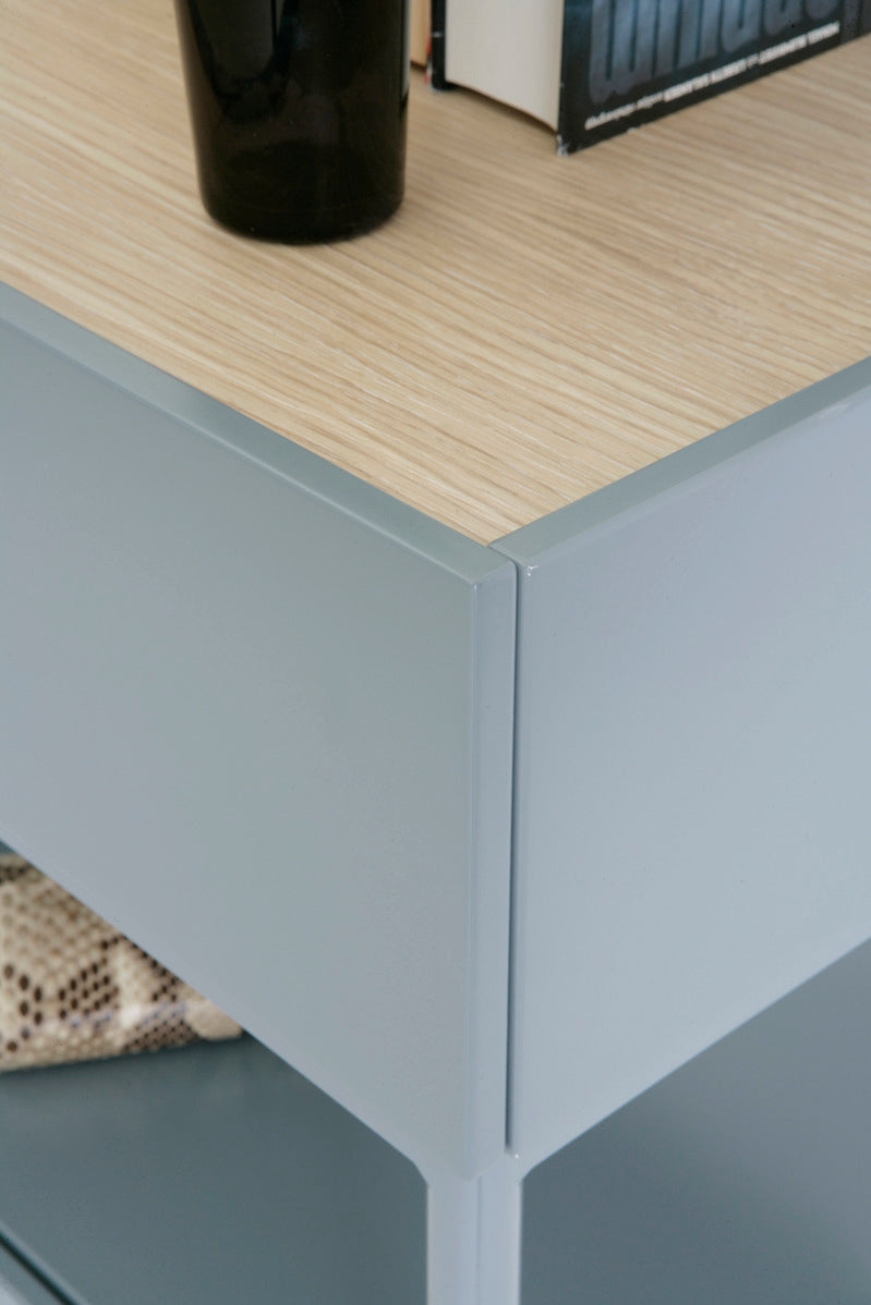 Designed by Broberg and Ridderstråle 2015.  Console in lacquered MDF with one drawer with a brass knob and a lacquered MDF shelf. Stand in lacquered metal and top in stone or oak veneer. Only available in monochrome colors on drawers, shelves, and stand.
