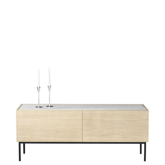Designed by Broberg and Ridderstråle 2012.  Storage unit with 2 drawers and a stand in lacquered metal and stone or glass top.