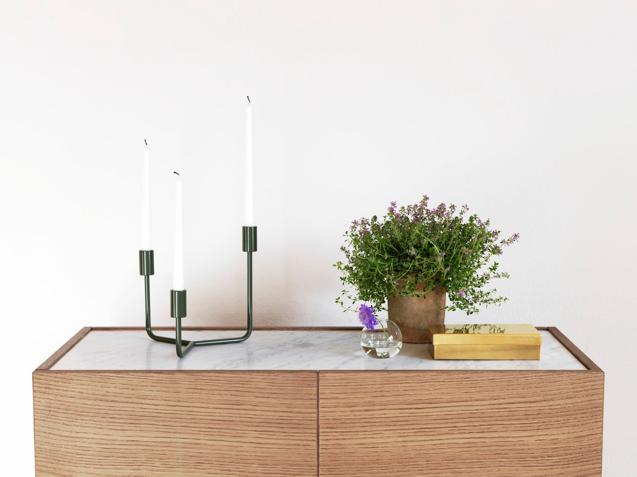 Designed by Broberg and Ridderstråle 2012.  Storage unit with 2 drawers and a stand in lacquered metal and stone or glass top.