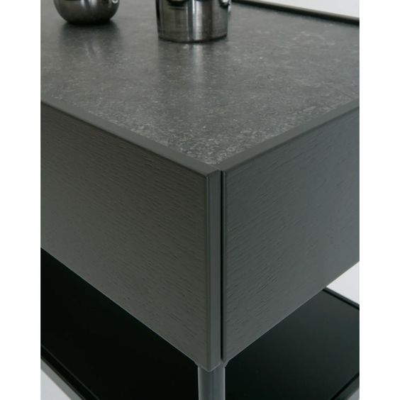 Designed by Broberg and Ridderstråle 2015.  Console in lacquered MDF with 2 drawers with brass knobs and a lacquered MDF shelf. Stand in lacquered metal and top in stone or oak veneer.
