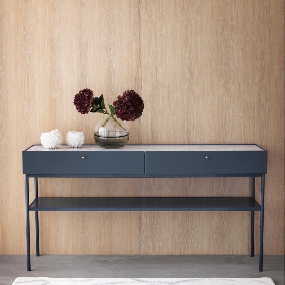 Designed by Broberg and Ridderstråle 2015.  Console in lacquered MDF with 2 drawers with brass knobs and a lacquered MDF shelf. Stand in lacquered metal and top in stone or oak veneer.