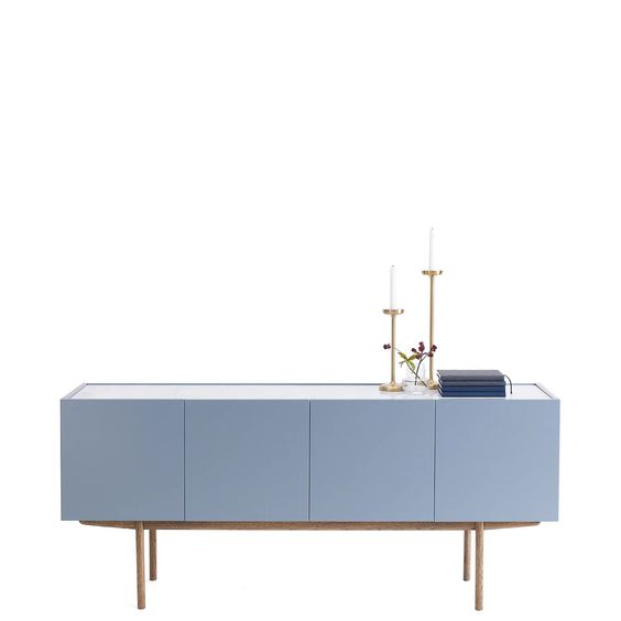 Designed by Broberg and Ridderstråle 2012. Storage in lacquered oak veneer with a wooden base and stone top. Cabinet with two compartments and four doors. One shelf in each compartment.