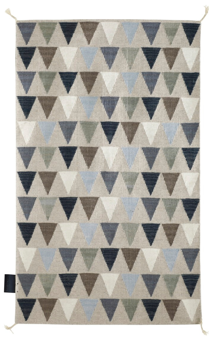 Designed by Thomas Sandell 2010.  Hand woven Kelim rug with pattern in contrasting colors. The kelim yarn is selected to be extra soft and lustrous. 