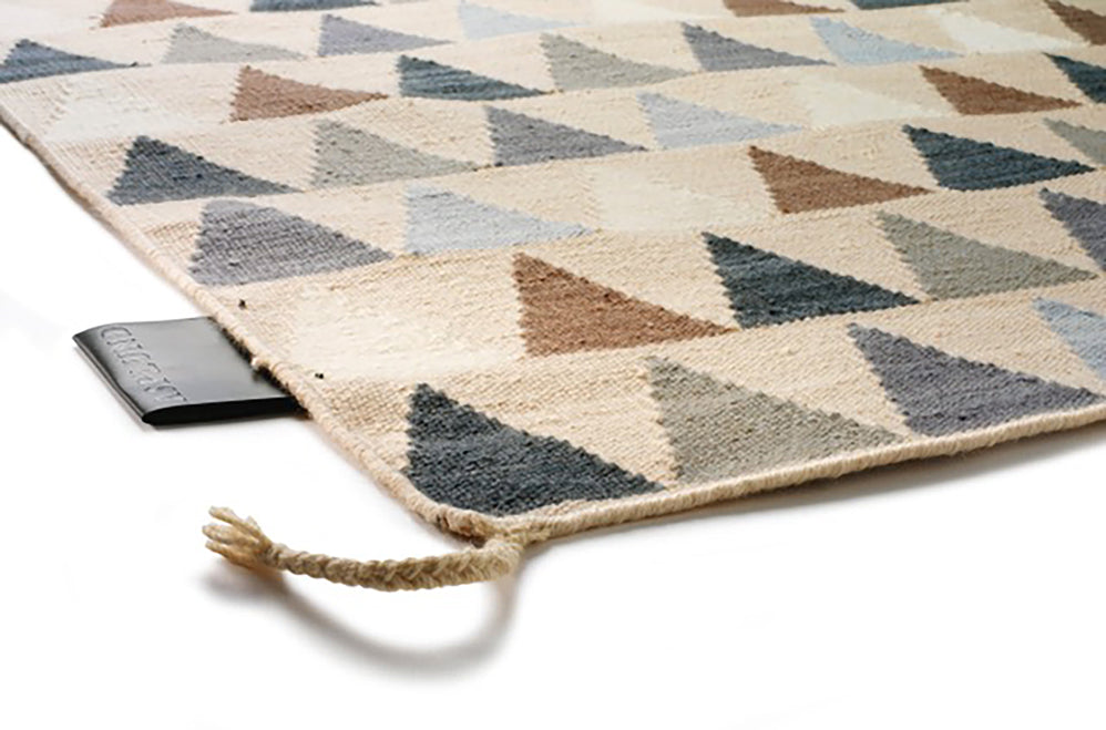 Designed by Thomas Sandell 2010. Hand woven Kelim rug with pattern in contrasting colors. The kelim yarn is selected to be extra soft and lustrous. 