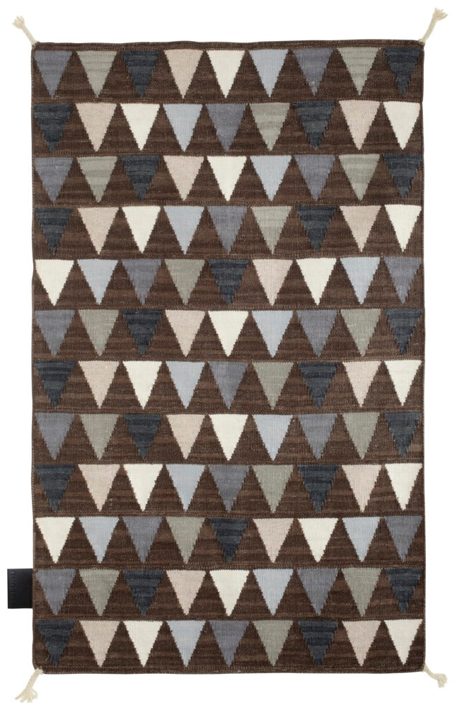 Designed by Thomas Sandell 2010. Hand woven Kelim rug with pattern in contrasting colors. The kelim yarn is selected to be extra soft and lustrous. 
