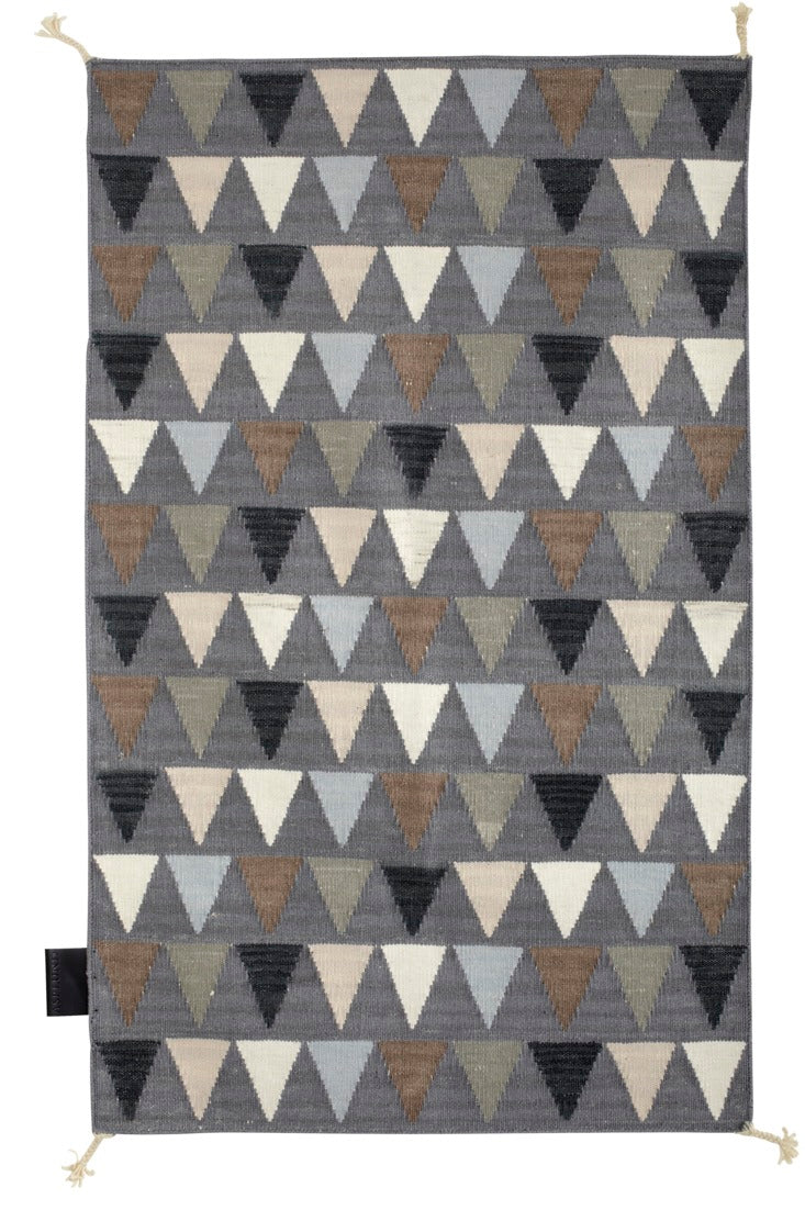 Designed by Thomas Sandell 2010. Hand woven Kelim rug with pattern in contrasting colors. The kelim yarn is selected to be extra soft and lustrous. 