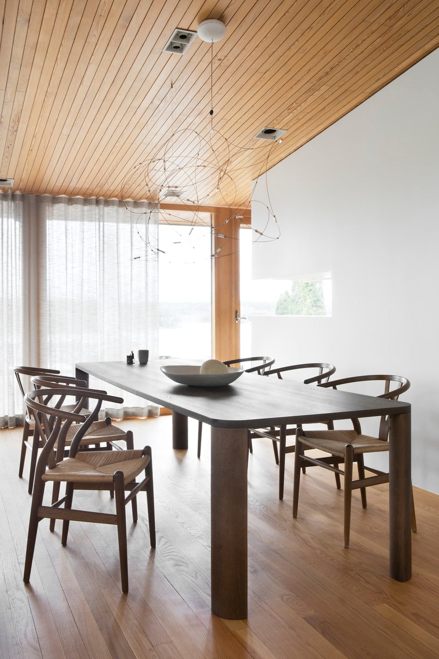 Designed by Moa Sjöberg 2021/22. Moci is a handcrafted and generous table for dining or conference purposes with massive oak legs and an oak veneer top. Available in two sizes and three colors. Made in Sweden.