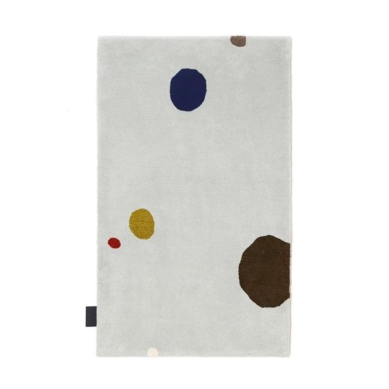Designed by Thomas Sandell 2008.  Hand tufted rug with set base colors and pattern in contrasting colors.