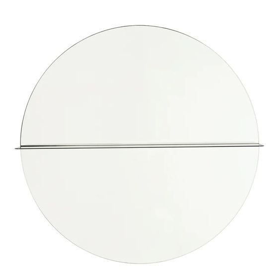 Designed by Anya Sebton and Eva Lilja Löwenhielm 2016. Round mirror with a horizontal metal shelf. Metal wall fixture included. Screws for attachment against the wall are not included.