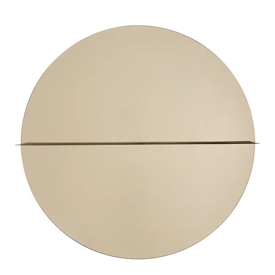 Designed by Anya Sebton and Eva Lilja Löwenhielm 2016. Round mirror with a horizontal metal shelf. Metal wall fixture included. Screws for attachment against the wall are not included.