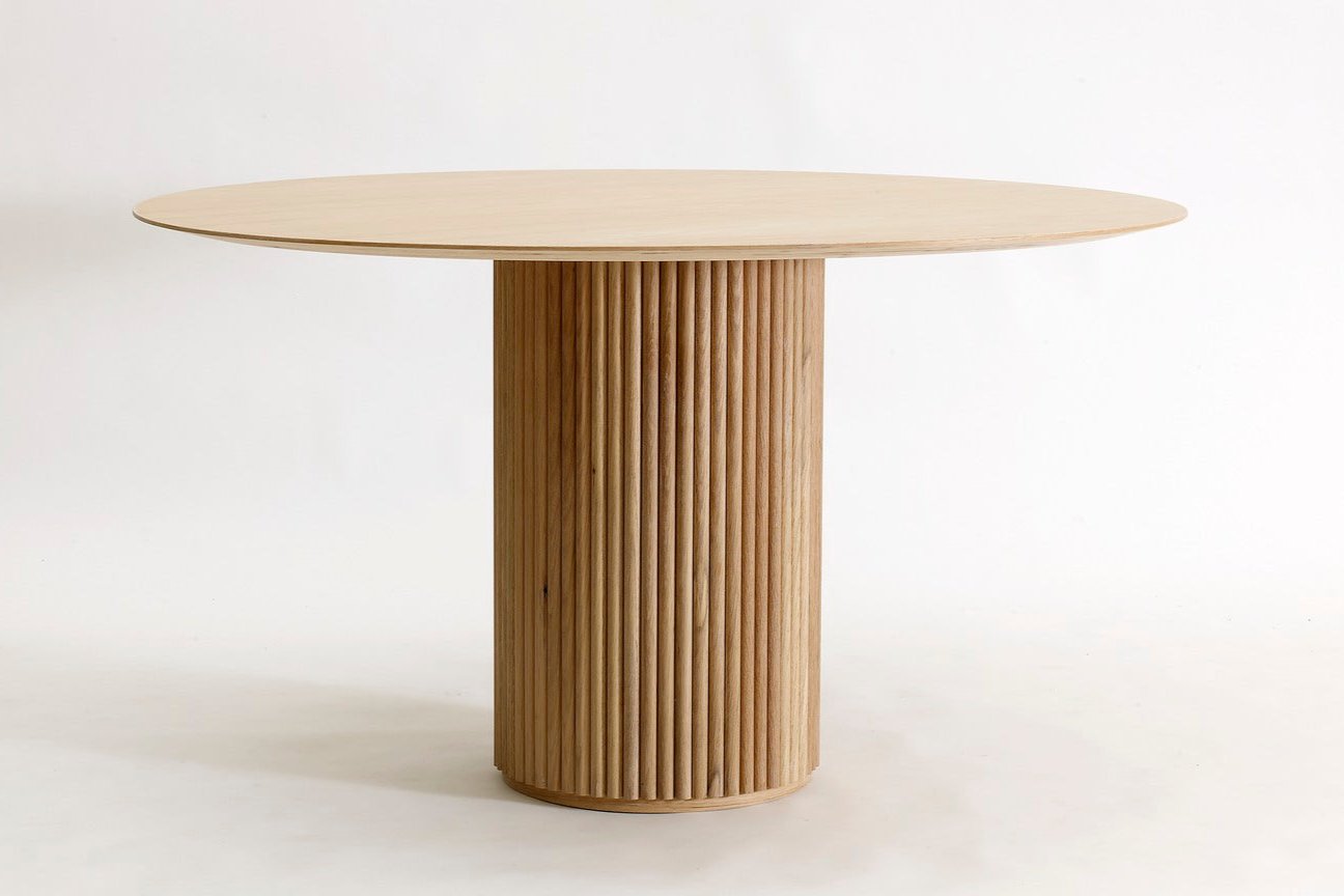 Designed by Anya Sebton and Eva Lilja Löwenhielm 2018.  Round table with base in solid oak or ash panels. Top in veneer with a solid oak edge in the same color as the base. Available in multiple color options.