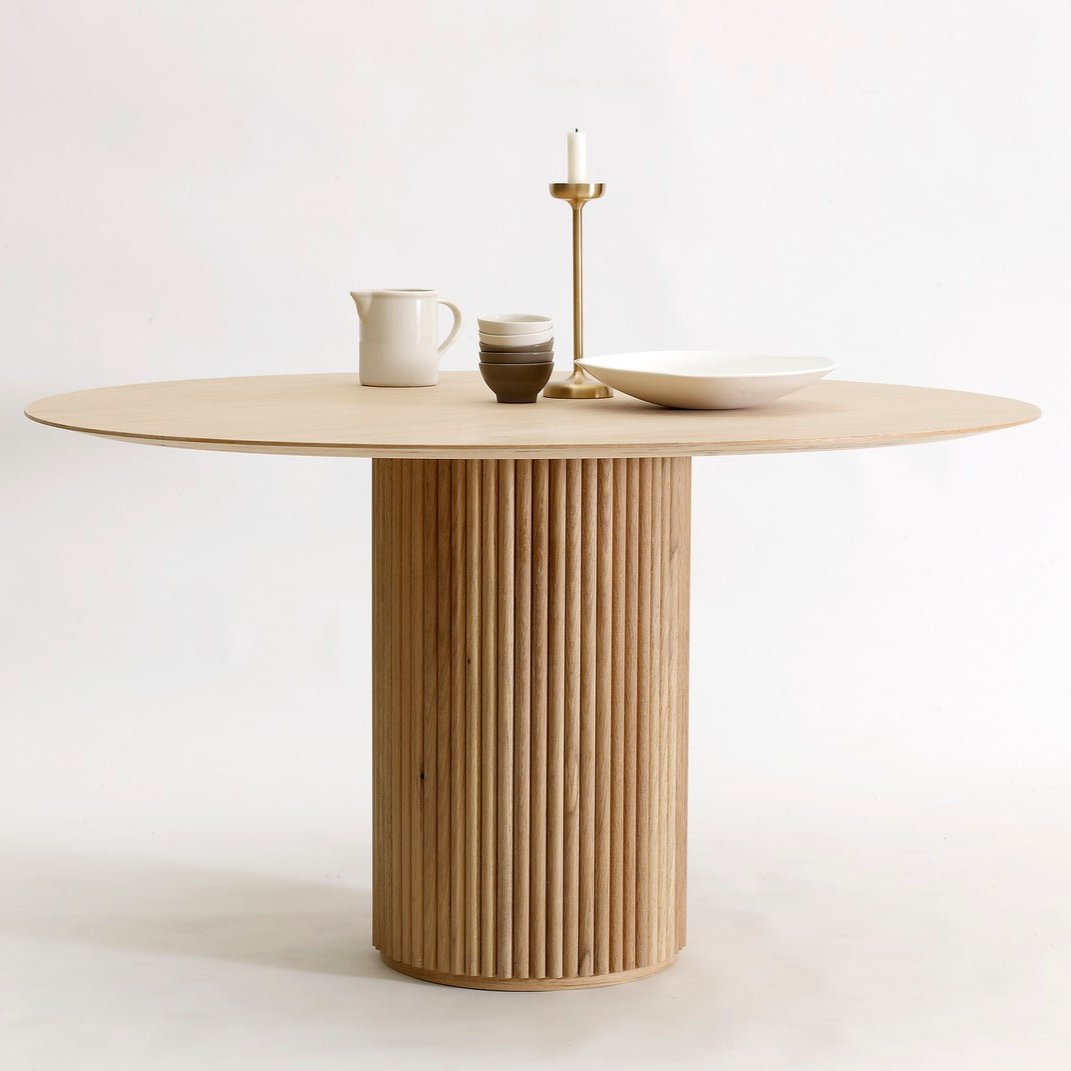 Designed by Anya Sebton and Eva Lilja Löwenhielm 2018.  Round table with base in solid oak or ash panels. Top in veneer with a solid oak edge in the same color as the base. Available in multiple color options.