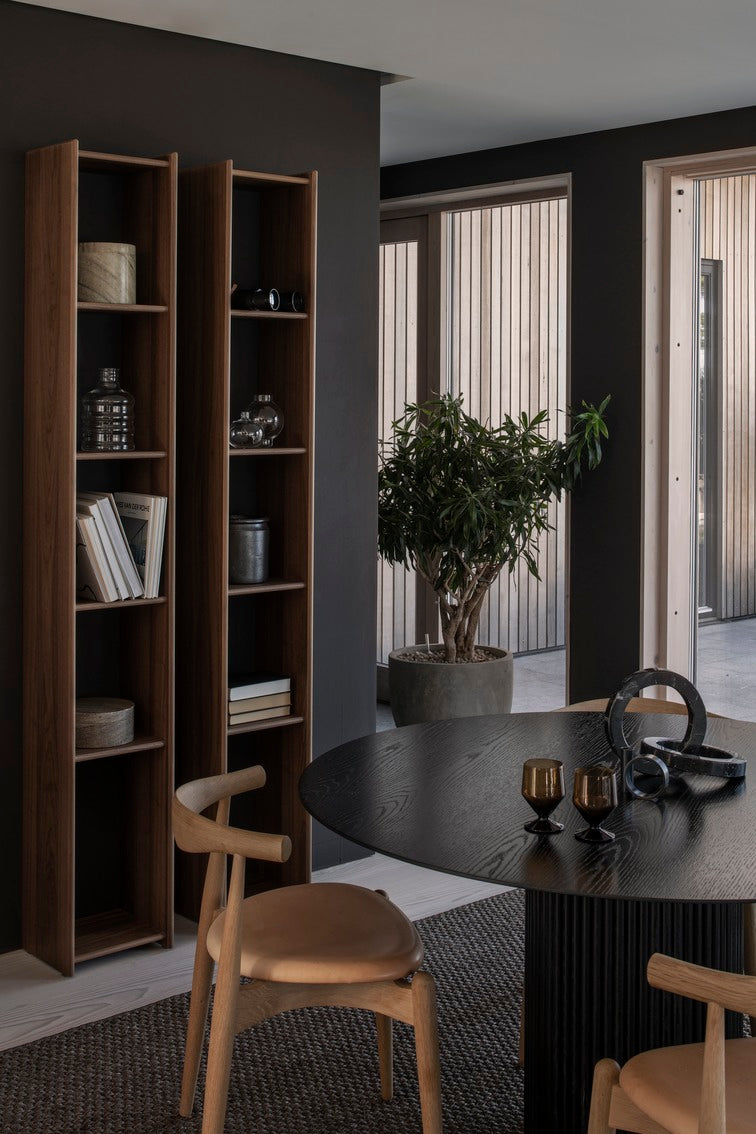 Designed by Anya Sebton and Eva Lilja Löwenhielm 2018.  Round table with base in solid oak or ash panels. Top in veneer with a solid oak edge in the same color as the base. Available in multiple color options.