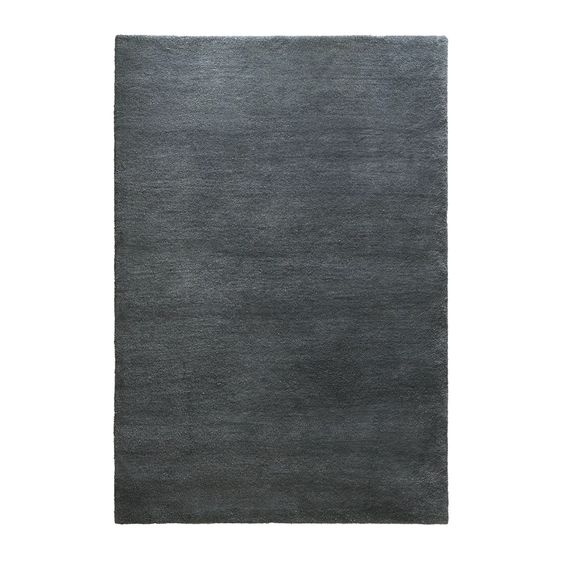 Designed by ASPLUND Studio.  Hand tufted rug in a solid color. 