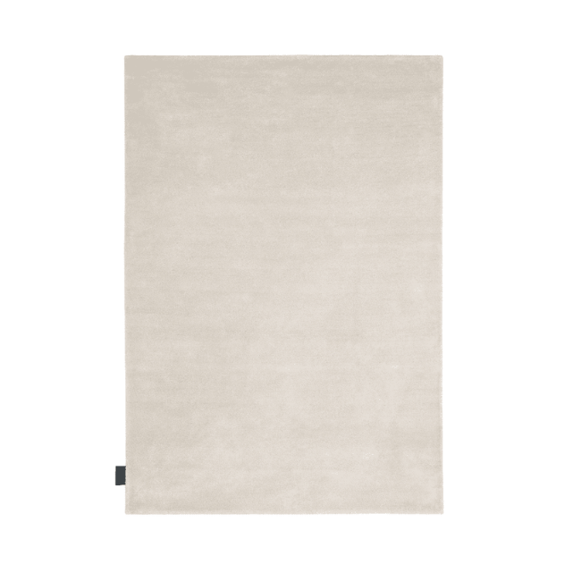 Designed by ASPLUND Studio.  Hand tufted rug in a solid color. 