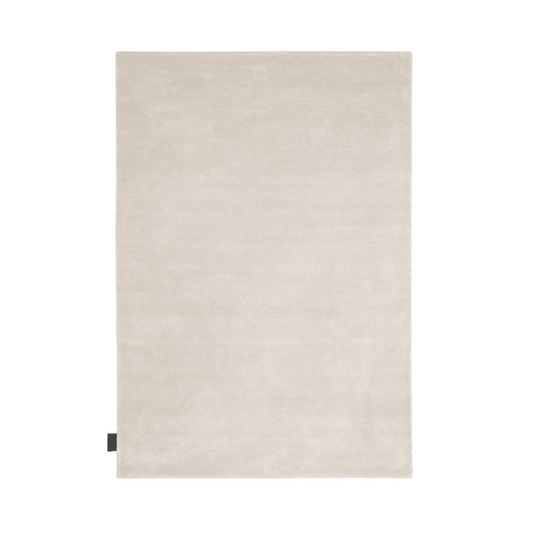 Designed by ASPLUND Studio.  Hand tufted rug in a solid color. 