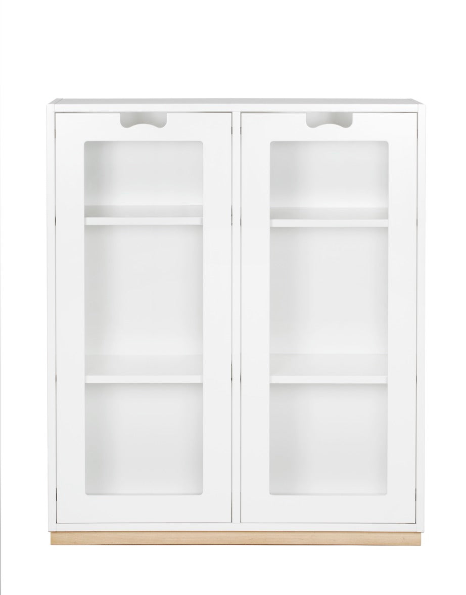 Designed by Thomas Sandell and Jonas Bohlin 1994. The classic Snow Cabinet E has 2 soft-closing glass doors, a middle partition, and four shelves. Extra shelves can be ordered. Choose between two depths.