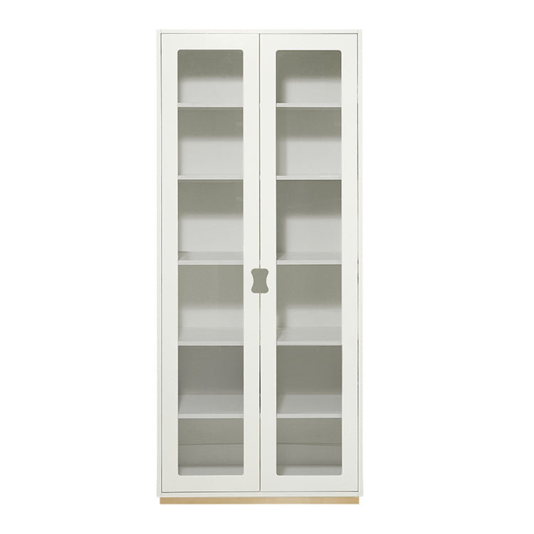 Designed by Thomas Sandell and Jonas Bohlin 1994. The classic high Snow Cabinet F has two soft-closing glass doors, 4 adjustable lacquered shelves, and 1 fixed shelf. Extra shelves can be ordered. Choose between two depths.