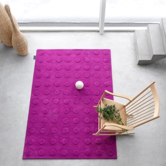Designed by Pia Wallén 1994. Hand-tufted rug with a hand-cut pattern in convex relief.