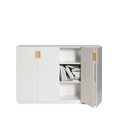 Designed by Anya Sebton and Eva Lilja Löwenhielm 2014.  Storage unit with 2 folding doors and handles in leather with 2 compartments and 2 lacquered shelves. 