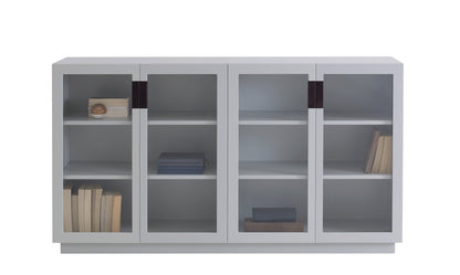 Designed by Anya Sebton and Eva Lilja Löwenhielm 2014.  Storage unit with 2 sliding doors and handles in leather with 2 compartments and 4 lacquered adjustable shelves. 
