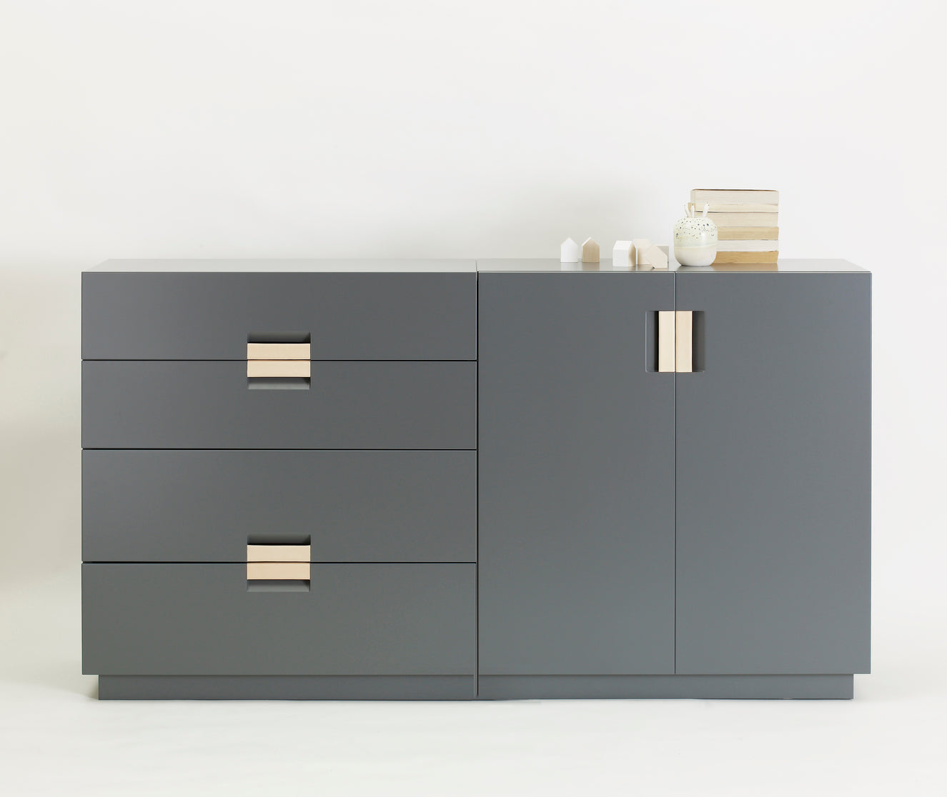 Designed by Anya Sebton and Eva Lilja Löwenhielm 2014.  Storage unit with 2 medium and 2 large drawers.