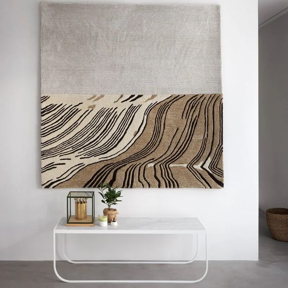 The Horizon Field rug has a field landscape, hand-cut details, and mixed compositions of yarn in a fixed blend. It is made of a special wool and Tencel blend. Horizon is designed to be hung on the wall or lay on the floor.