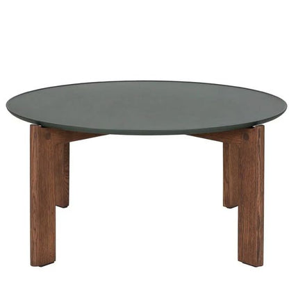 Designed by Daniel Lavonius Jarefeldt 2023.  Iris round coffee table with a monochrome top with&nbsp;a distinctive raised edge. This comes in four colors that can be nicely combined in a setting with stone tops. Available in all three sizes.