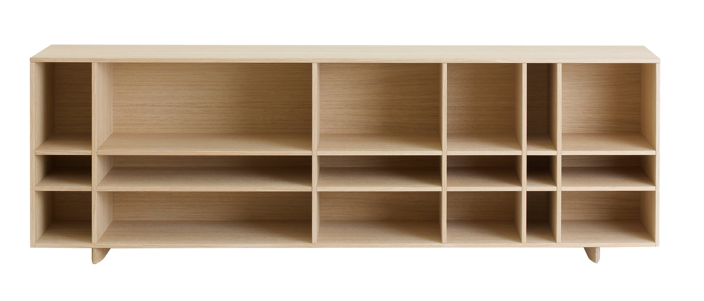 Designed by Claesson Koivisto Rune 2010.  The Kilt Sideboard 180 (Open) open storage in oak veneer with a fixed interior. Sideboard and runners in monochrome colors.