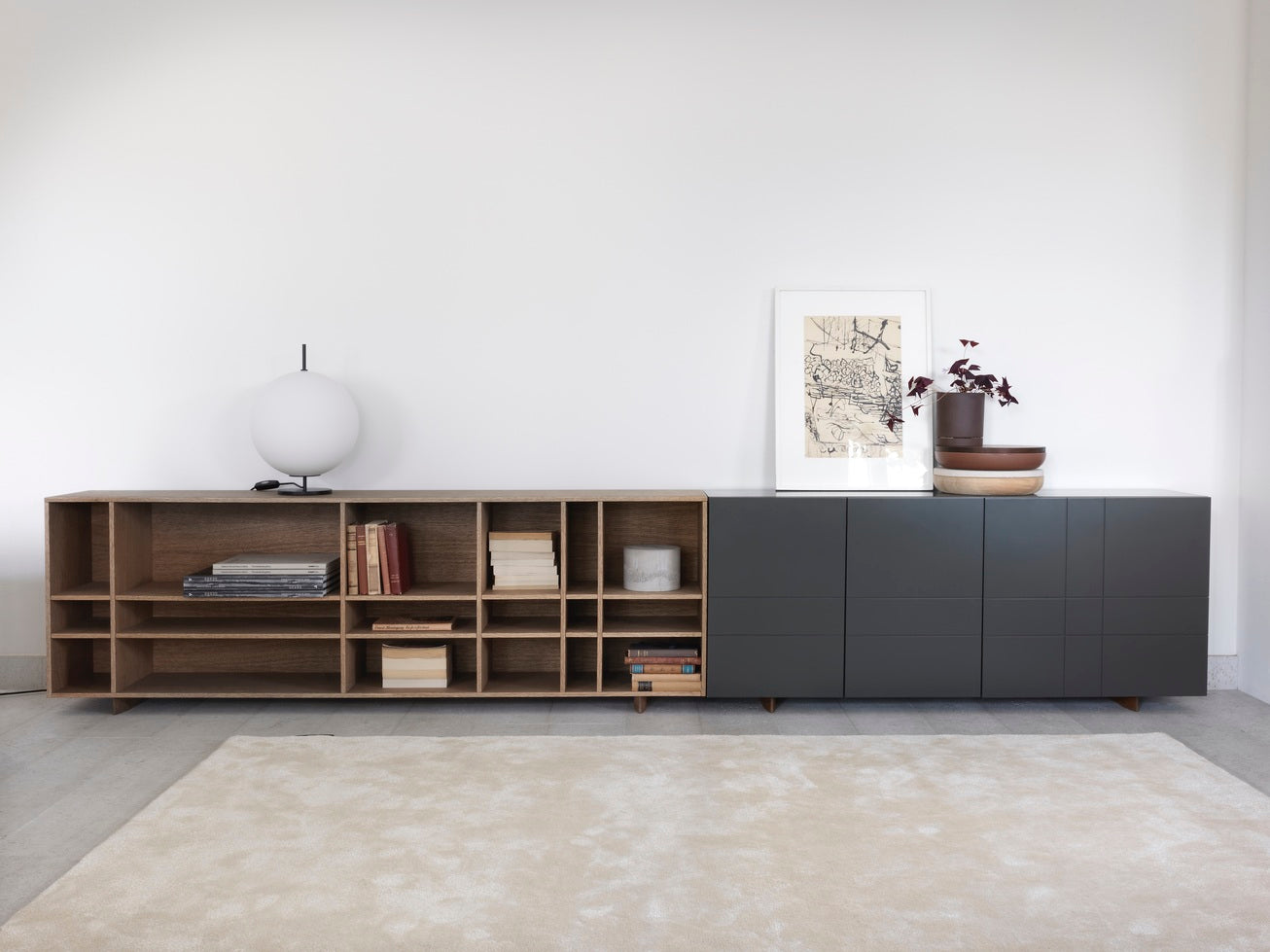 Designed by Claesson Koivisto Rune 2010.  The Kilt Sideboard 180 (Open) open storage in oak veneer with a fixed interior. Sideboard and runners in monochrome colors.