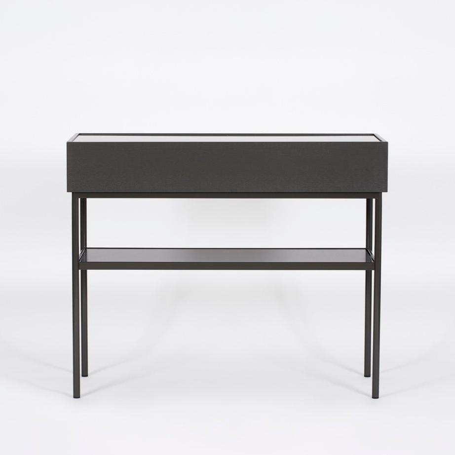 Designed by Broberg and Ridderstråle 2015.  Console in lacquered MDF with one drawer with a brass knob and a lacquered MDF shelf. Stand in lacquered metal and top in stone or oak veneer. Only available in monochrome colors on drawers, shelves, and stand.