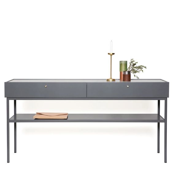 Designed by Broberg and Ridderstråle 2015.  Console in lacquered MDF with 2 drawers with brass knobs and a lacquered MDF shelf. Stand in lacquered metal and top in stone or oak veneer. 