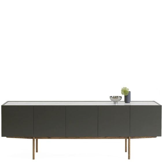 Designed by Broberg and Ridderstråle.  Storage in lacquered oak veneer with a wooden base and stone top. Cabinet with two compartments and four doors. One shelf in each compartment.