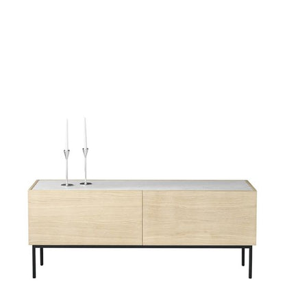 Designed by Broberg and Ridderstråle 2012.  Storage unit with 2 drawers and a stand in lacquered metal and stone or glass top. 