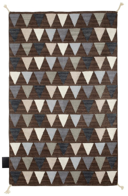 Designed by Thomas Sandell 2010.  Hand woven Kelim rug with pattern in contrasting colors. The kelim yarn is selected to be extra soft and lustrous.&nbsp;