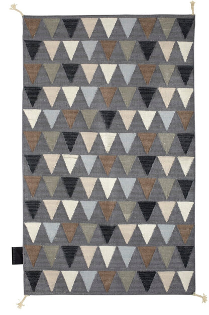 Designed by Thomas Sandell 2010.  Hand woven Kelim rug with pattern in contrasting colors. The kelim yarn is selected to be extra soft and lustrous.&nbsp;