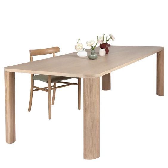 Designed by Moa Sjöberg 2021/22.  Moci is a handcrafted and generous table for dining or conference purposes with massive oak legs and an oak veneer top. Available in two sizes and three colors. Made in Sweden.