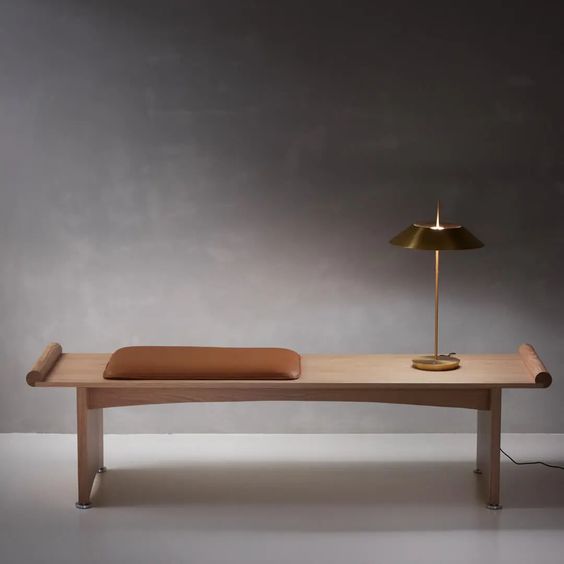 Designed by Broberg and Ridderstråle 2024.  A versatile, zen-like bench, sofa or table that fills many needs and functions. Its minimalistic and distinct design with classic dignity makes it suitable for both public and domestic spaces, offering a little pause whenever needed.