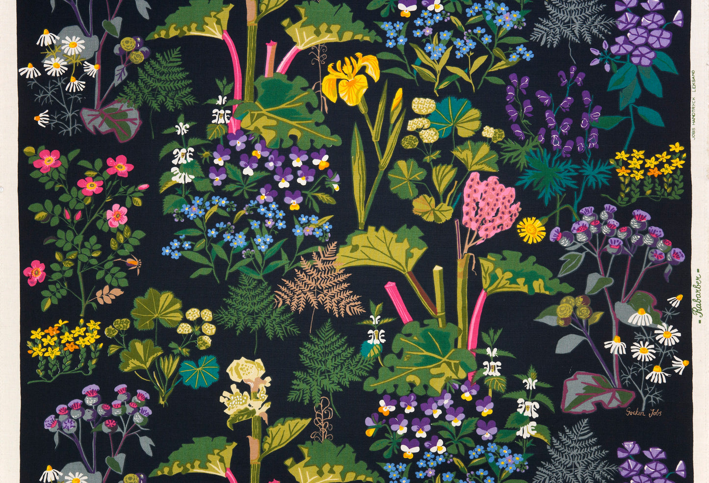 The Rabarber Fabric designed by Gocken Jobs 1968 boasts a vibrant, multi-colored pattern with lush plants including iris, viola, and rhubarb.