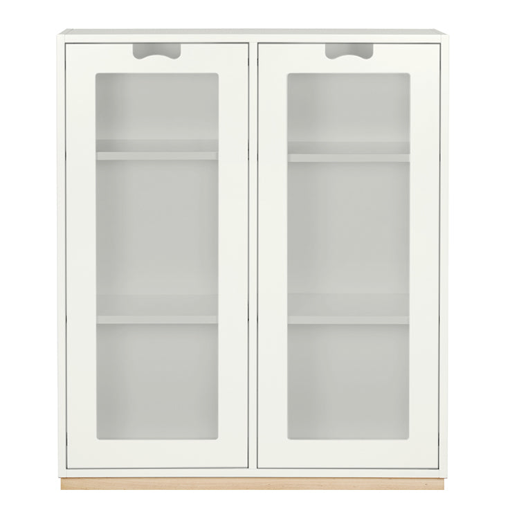 Designed by Thomas Sandell and Jonas Bohlin 1994.   The classic Snow Cabinet E has 2 soft-closing glass doors, a middle partition, and four shelves. Extra shelves can be ordered.  Choose between two depths.