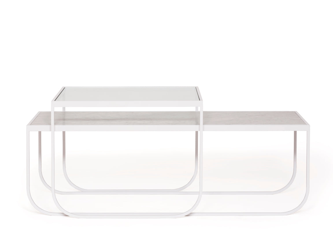 Designed by Broberg and Ridderstråle 2011.  Lounge table with a bent metal structure. Tati Lounge 65 can be slid over Tati Lounge 120.