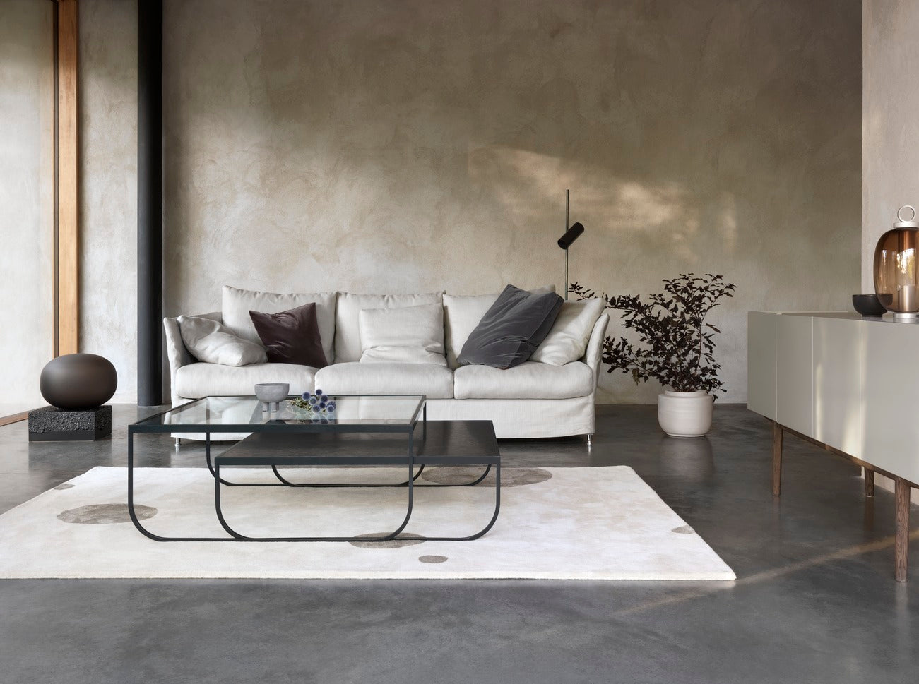 Designed by Broberg and Ridderstråle 2011.  Coffee table with a bent metal structure. Tati Coffee Table 90 High can be slid over Tati Coffee Table 90 Low.